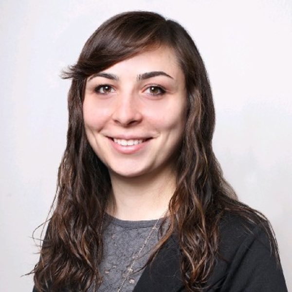 Carly Rosenthal, certified dog trainer, working with a dog using reward-based science-backed methods